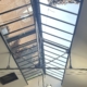 Réhabilitation énergétique et d'étanchéité d'une verrière de toiture surplombant un loft résidentiel à Villeurbanne par la Vitrerie Stéphanoise.
